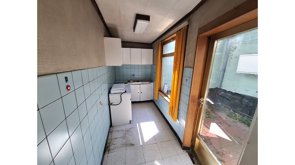 Te renoveren 2-slaapkamerwoning met stadsterras te koop in Brugge